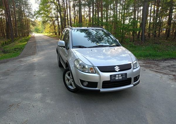 Suzuki SX4 cena 26990 przebieg: 170000, rok produkcji 2009 z Stepnica małe 379